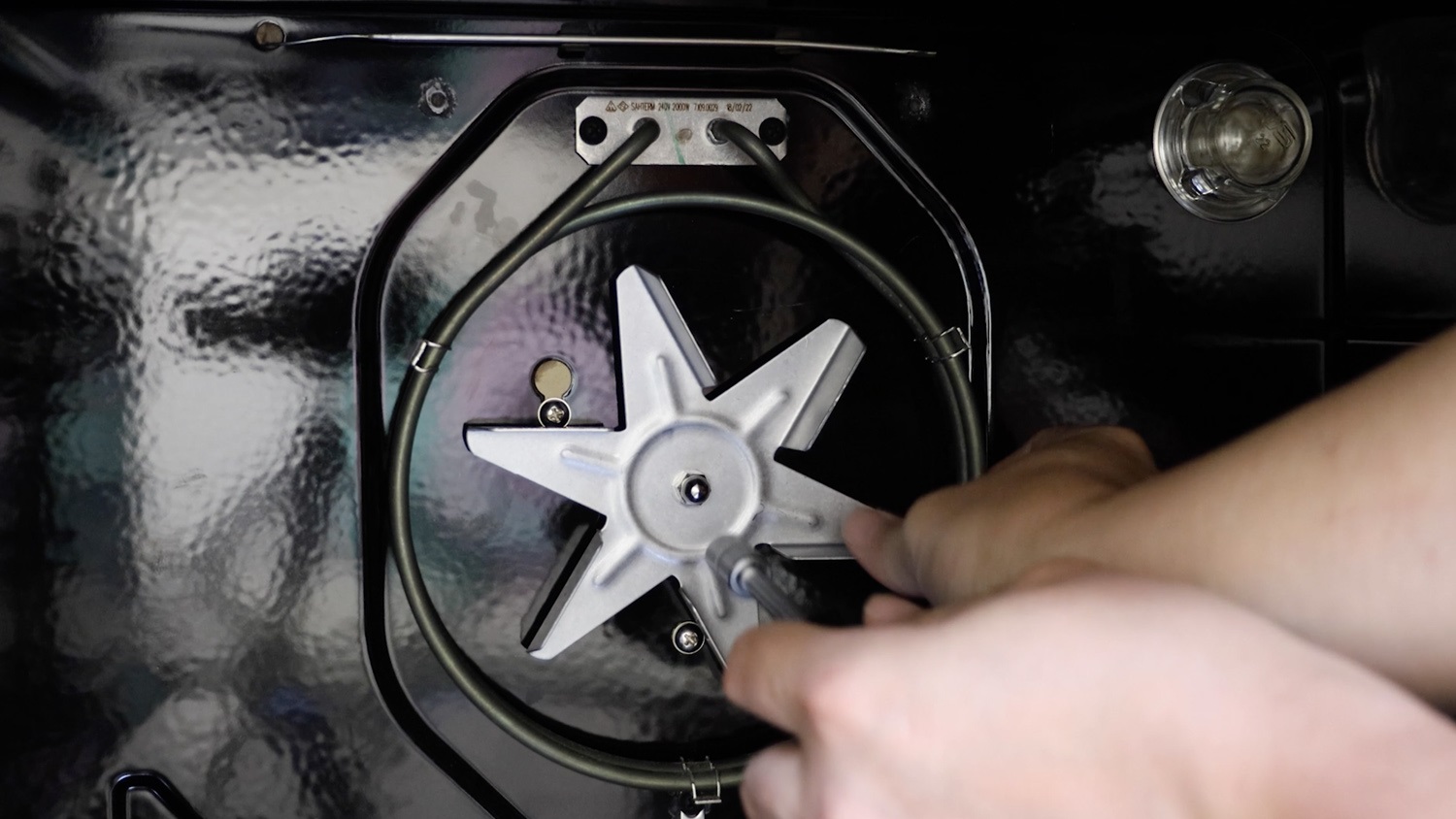 Re-attach fan and tighten bolt